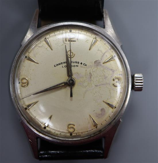 A gentlemans 1960s? stainless steel manual wind wrist watch, retailed by Camerer Cuss & Co, London,